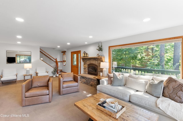 515 S Idaho St, Post Falls, ID 83854 - living room featuring recessed lighting, stairway, carpet floors, and a stone fireplace