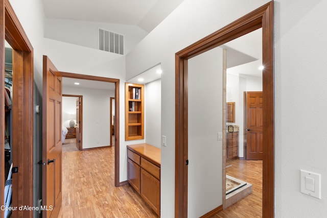 515 S Idaho St, Post Falls, ID 83854 - corridor with light wood-style floors, vaulted ceiling, and recessed lighting