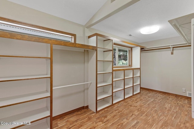 515 S Idaho St, Post Falls, ID 83854 - walk in closet featuring light wood finished floors
