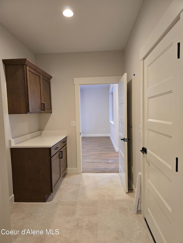 8675 W Hood St, Rathdrum, ID 83858 - laundry room featuring recessed lighting and baseboards
