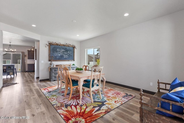 1546 N Tatum Dr, Post Falls, ID 83854 - dining space with a chandelier, light wood-style flooring, and recessed lighting