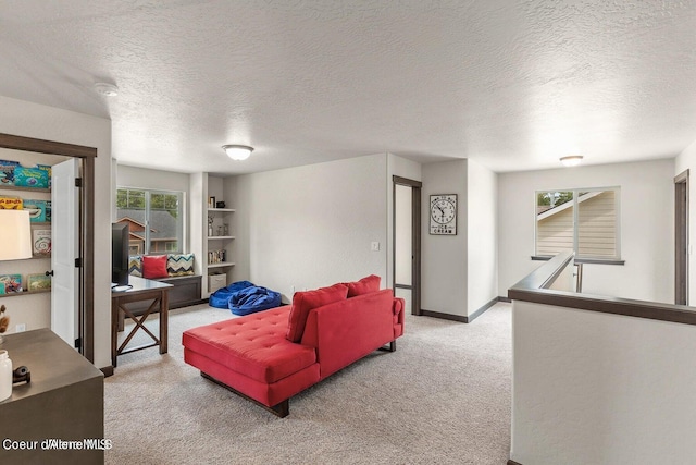1546 N Tatum Dr, Post Falls, ID 83854 - living room with light carpet and a textured ceiling