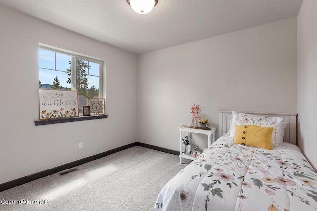 1546 N Tatum Dr, Post Falls, ID 83854 - carpeted bedroom with baseboards