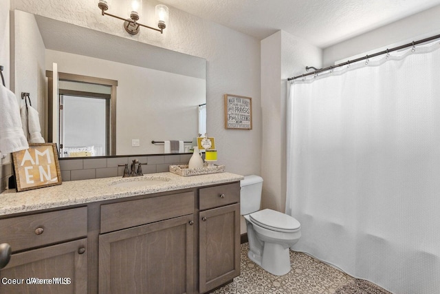 1546 N Tatum Dr, Post Falls, ID 83854 - bathroom featuring vanity, a shower with curtain, and tasteful backsplash