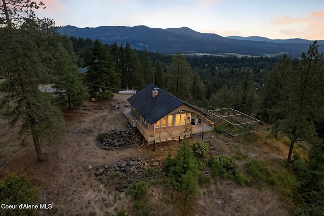 1149 E Dunromin Rd, Priest River, ID 83856 - aerial view at dusk of a wooded view and a mountain view