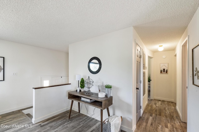 1024 W Mill Ave, Coeur Dalene, ID 83814 - hall with wood finished floors and a textured ceiling