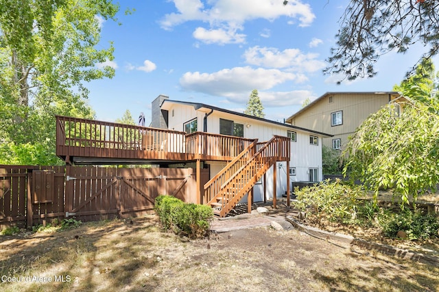 1024 W Mill Ave, Coeur Dalene, ID 83814 - rear view of house featuring a deck and stairway