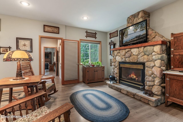 512 River Dr, Clark Fork, ID 83811 - living area featuring a fireplace, light wood-style floors, and recessed lighting