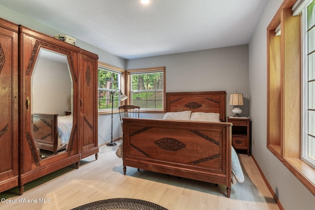 512 River Dr, Clark Fork, ID 83811 - bedroom featuring wood finished floors