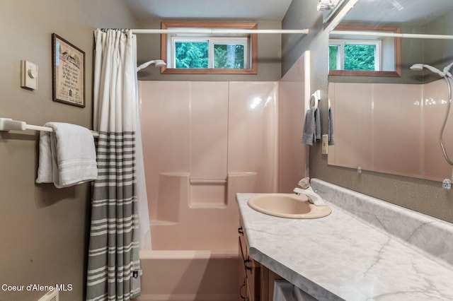 512 River Dr, Clark Fork, ID 83811 - full bath with vanity, shower / bath combination with curtain, and healthy amount of natural light