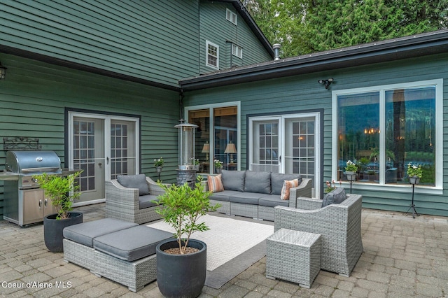 512 River Dr, Clark Fork, ID 83811 - view of patio with an outdoor hangout area and area for grilling