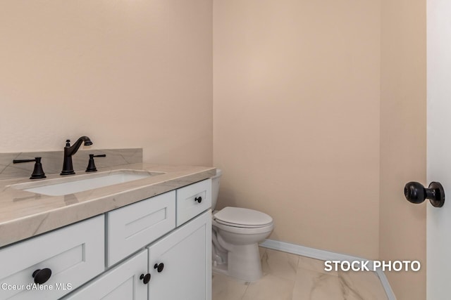 L1B1 Sylvan Rd, Athol, ID 83801 - half bathroom featuring marble look tile flooring and vanity