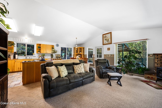 2711 S Carpenter Loop, Post Falls, ID 83854 - living area with light colored carpet and vaulted ceiling