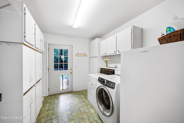 2711 S Carpenter Loop, Post Falls, ID 83854 - washroom with cabinet space, separate washer and dryer, and stone finish floors
