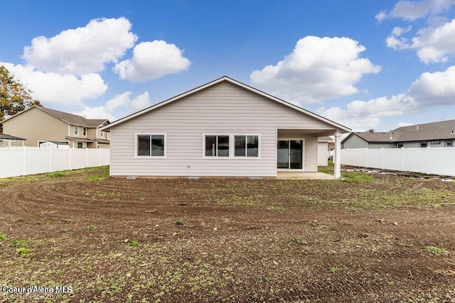 4300 N Arrowleaf Loop, Post Falls, ID 83854 - rear view of house with a patio