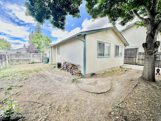 3674 E 2nd Ave, Post Falls, ID 83854 - view of side of home with a fenced backyard