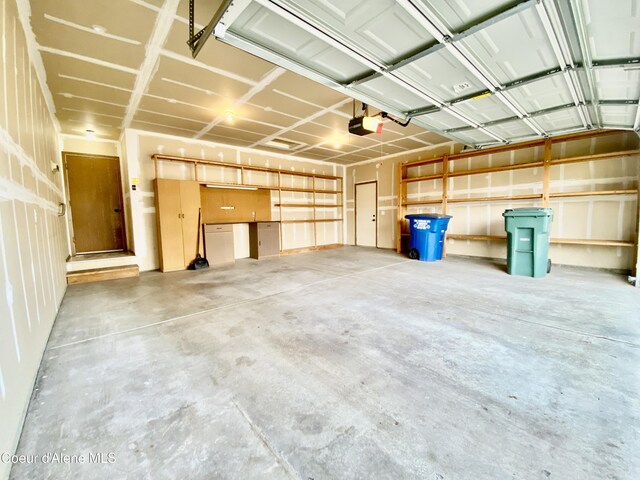 3674 E 2nd Ave, Post Falls, ID 83854 - garage featuring a garage door opener