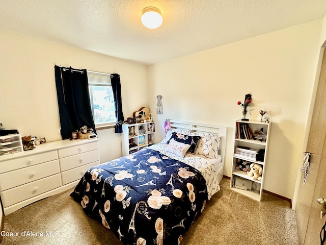 3674 E 2nd Ave, Post Falls, ID 83854 - bedroom featuring carpet and a textured ceiling
