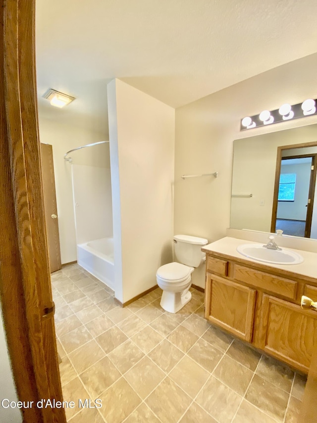 3674 E 2nd Ave, Post Falls, ID 83854 - bathroom featuring vanity, shower / washtub combination, and tile patterned flooring