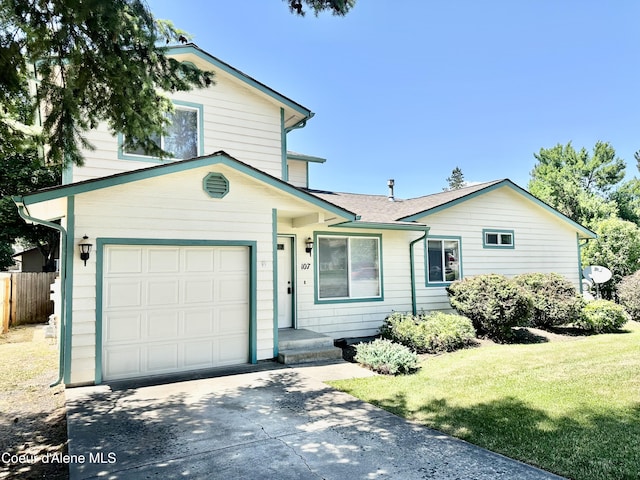 3674 E 2nd Ave, Post Falls, ID 83854 - view of front facade featuring an attached garage and driveway