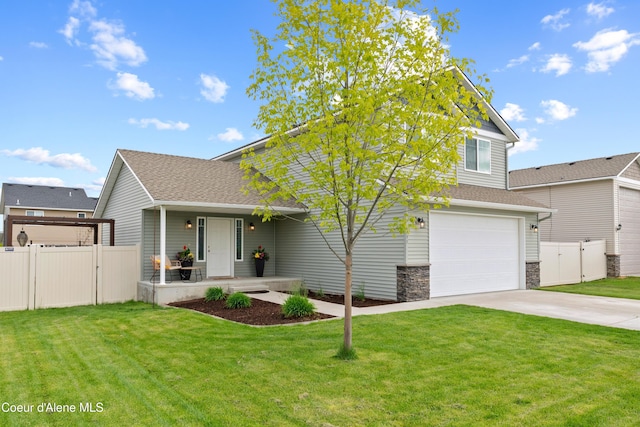 6595 W Covenant St, Rathdrum, ID 83858 - view of front facade with a gate, driveway, an attached garage, and roof with shingles