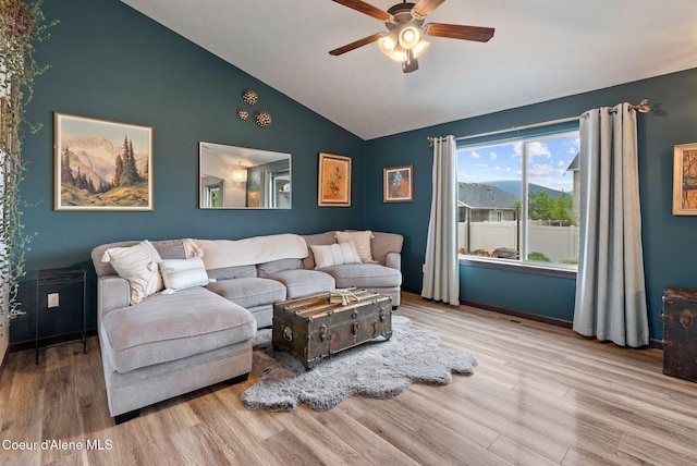 6595 W Covenant St, Rathdrum, ID 83858 - living area with a ceiling fan, wood finished floors, and lofted ceiling
