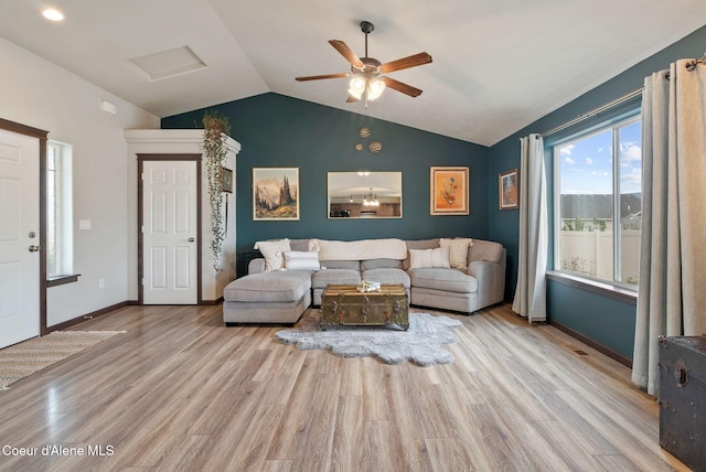 6595 W Covenant St, Rathdrum, ID 83858 - living room with lofted ceiling, wood finished floors, ceiling fan, and attic access