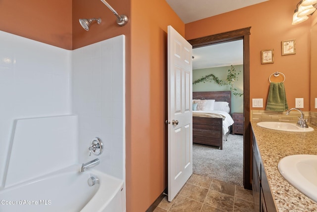 6595 W Covenant St, Rathdrum, ID 83858 - bathroom featuring double vanity, bathtub / shower combination, and ensuite bathroom