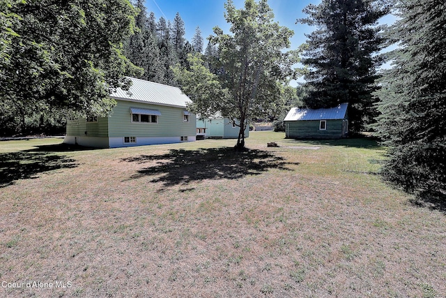 67 Nuchols Gulch Rd, Osburn, ID 83849 - view of green lawn with an outdoor structure