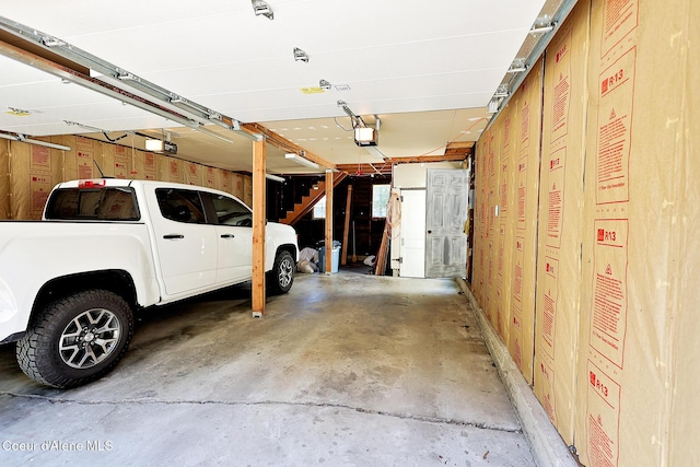 67 Nuchols Gulch Rd, Osburn, ID 83849 - garage with a garage door opener