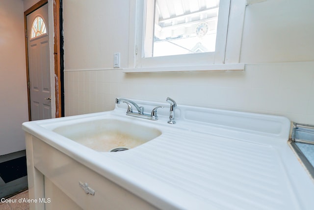 67 Nuchols Gulch Rd, Osburn, ID 83849 - bathroom with tile walls, vanity, and wainscoting