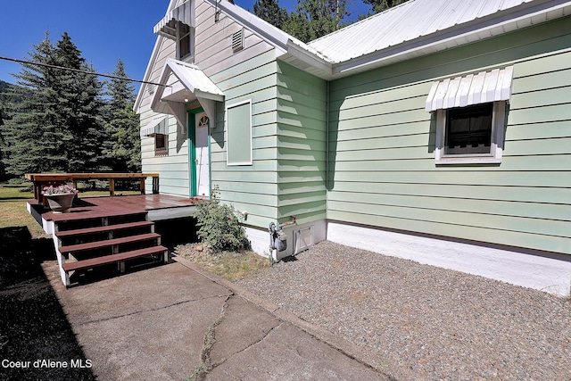 67 Nuchols Gulch Rd, Osburn, ID 83849 - view of property exterior featuring a wooden deck and a metal roof