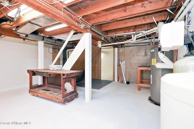 67 Nuchols Gulch Rd, Osburn, ID 83849 - unfinished below grade area featuring water heater and a water softener