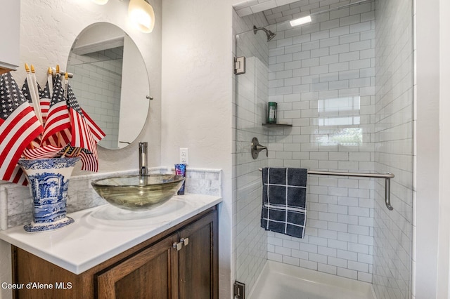 307 S 18th St, Coeur Dalene, ID 83814 - bathroom featuring vanity, a shower stall, and a textured wall
