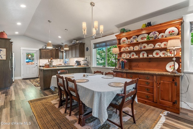 307 S 18th St, Coeur Dalene, ID 83814 - dining area featuring vaulted ceiling, wood finished floors, and recessed lighting