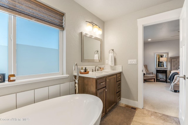 307 S 18th St, Coeur Dalene, ID 83814 - full bathroom featuring a soaking tub, connected bathroom, and vanity