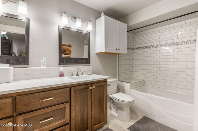 307 S 18th St, Coeur Dalene, ID 83814 - bathroom featuring vanity, tub / shower combination, and a textured wall