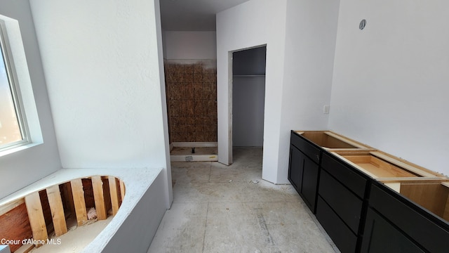 2003 E Plaza Ct, Post Falls, ID 83854 - bathroom with a tile shower and a bathtub
