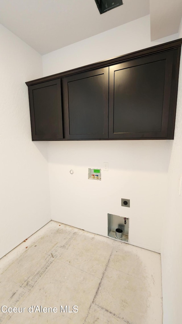 2003 E Plaza Ct, Post Falls, ID 83854 - laundry area featuring electric dryer hookup, cabinet space, washer hookup, and hookup for a gas dryer