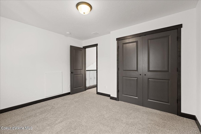 2003 E Plaza Ct, Post Falls, ID 83854 - unfurnished bedroom with carpet floors and a closet