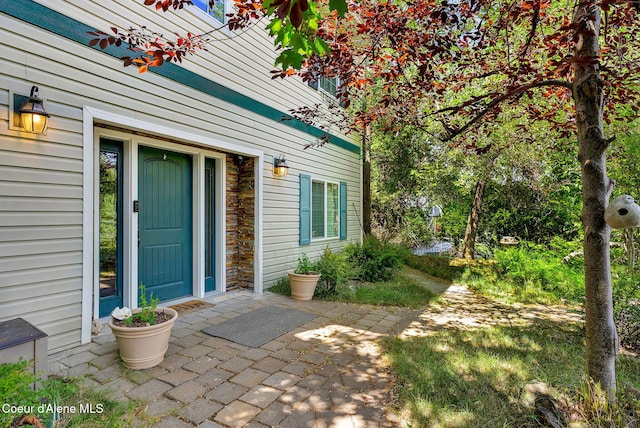 959 N Rutledge Ct, Coeur Dalene, ID 83814 - doorway to property with stone siding and a patio area
