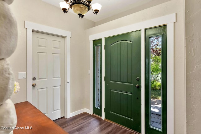 959 N Rutledge Ct, Coeur Dalene, ID 83814 - foyer featuring a chandelier and dark wood finished floors