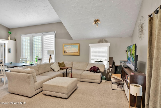 959 N Rutledge Ct, Coeur Dalene, ID 83814 - living area featuring a textured ceiling, carpet, cooling unit, and vaulted ceiling