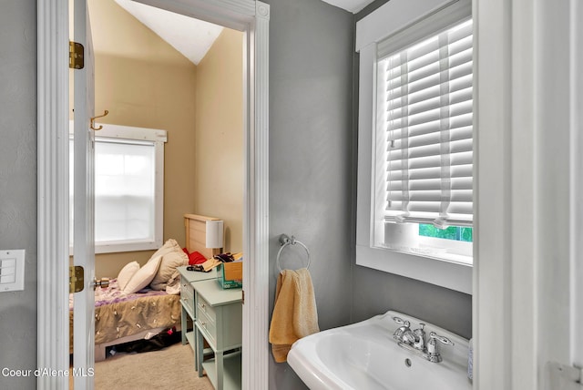 959 N Rutledge Ct, Coeur Dalene, ID 83814 - bathroom featuring a sink and vaulted ceiling