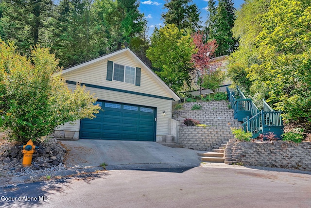 959 N Rutledge Ct, Coeur Dalene, ID 83814 - view of front of property with a garage, stairs, and concrete driveway