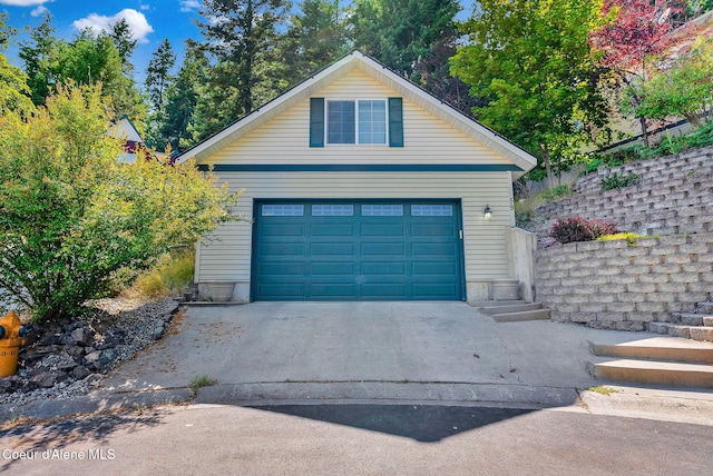 959 N Rutledge Ct, Coeur Dalene, ID 83814 - garage with concrete driveway