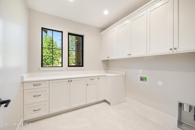 11551 N Bluejay Loop, Hayden, ID 83835 - laundry room with cabinet space, washer hookup, and recessed lighting