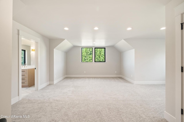 11551 N Bluejay Loop, Hayden, ID 83835 - bonus room with light colored carpet, recessed lighting, and vaulted ceiling