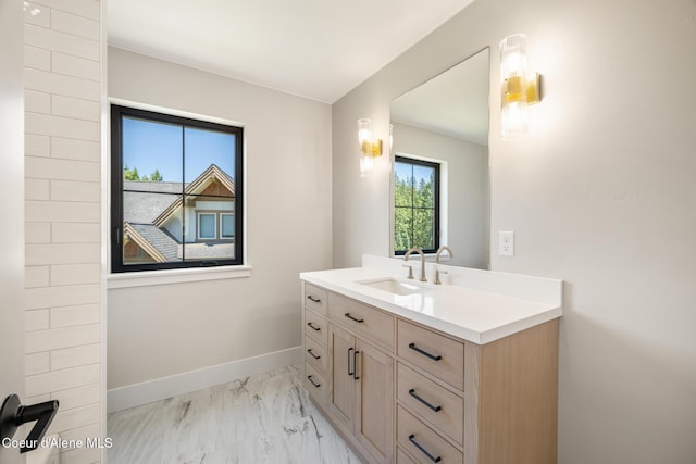 11551 N Bluejay Loop, Hayden, ID 83835 - bathroom with marble look tile flooring and vanity