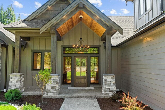 11551 N Bluejay Loop, Hayden, ID 83835 - property entrance with board and batten siding and roof with shingles